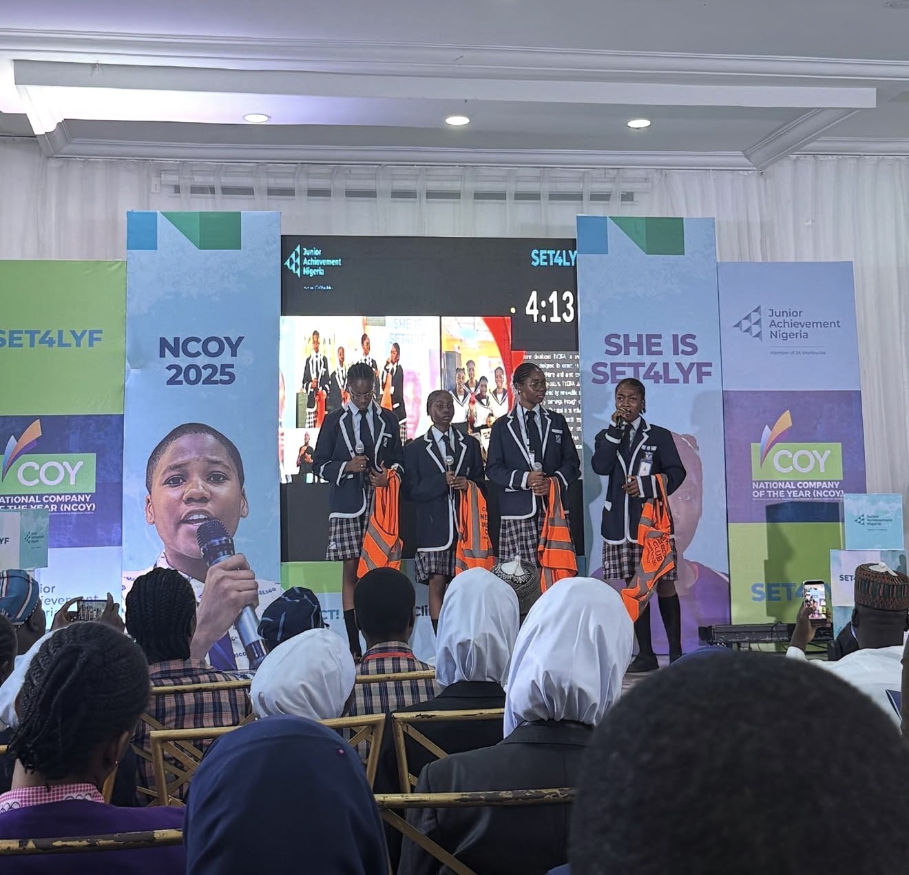 NCOY 2025 — student innovators on stage